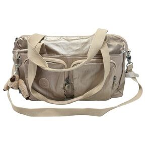 New Kipling Cyrene sparkling gold satchel bag.‎